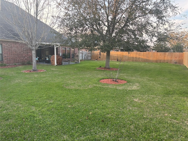 view of yard featuring a fenced backyard