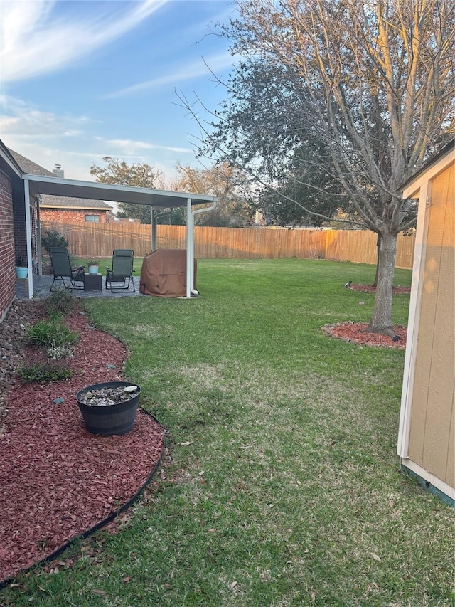 view of yard featuring a patio area and fence