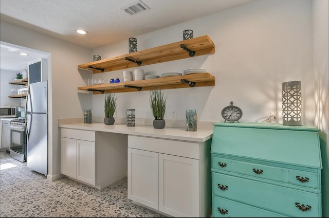 kitchen with recessed lighting, stainless steel appliances, white cabinetry, visible vents, and open shelves