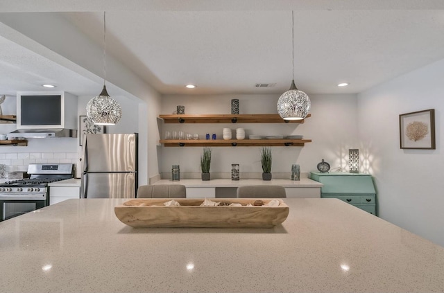 kitchen featuring open shelves, appliances with stainless steel finishes, range hood, and pendant lighting