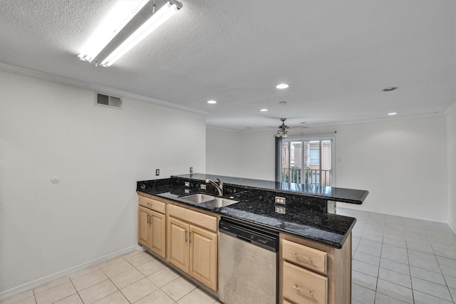 kitchen featuring light tile patterned floors, visible vents, dishwasher, a peninsula, and a sink