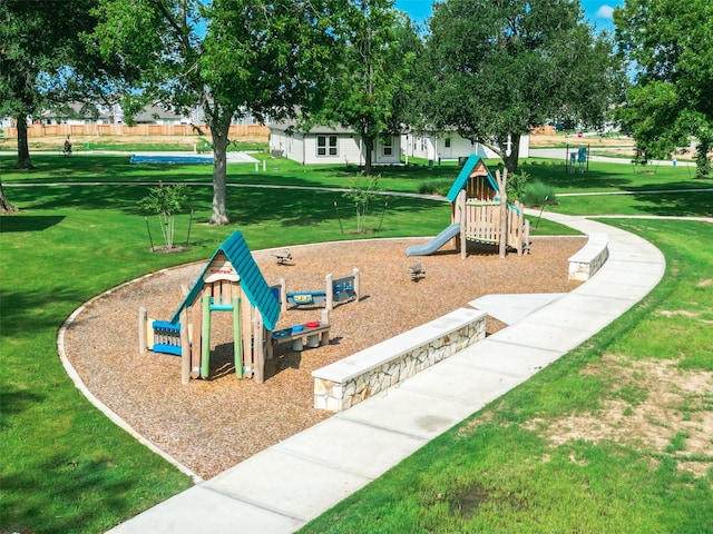 community play area with a yard