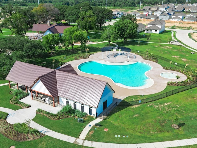 view of pool featuring a yard, fence, and a patio