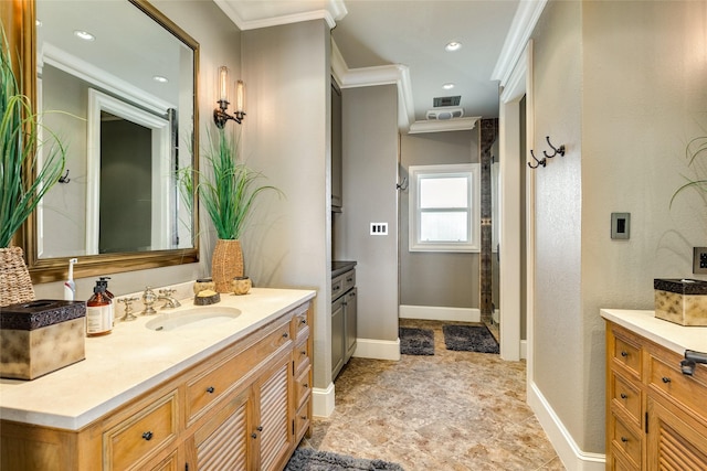 full bath with a shower, ornamental molding, vanity, and baseboards