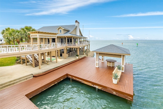 view of dock with a water view and stairway