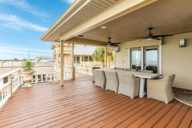 deck with a ceiling fan and outdoor dining space