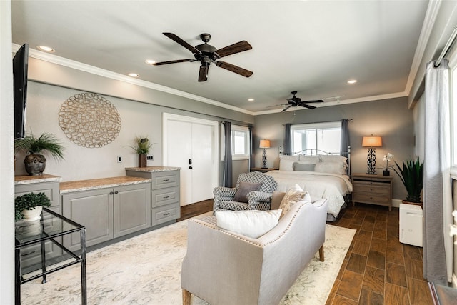 bedroom featuring ceiling fan, ornamental molding, wood finish floors, and recessed lighting