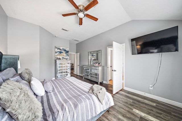 bedroom featuring baseboards, visible vents, a ceiling fan, lofted ceiling, and wood finished floors