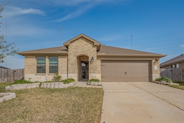 view of front of home featuring stone siding, driveway, a garage, and fence