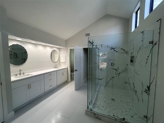 full bathroom with toilet, a marble finish shower, a sink, and visible vents