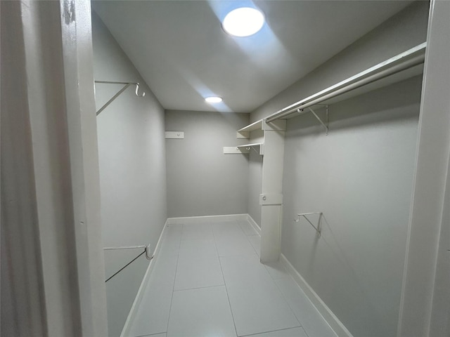 walk in closet featuring tile patterned floors