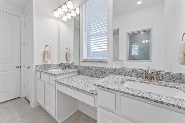 full bathroom with tile patterned flooring and vanity