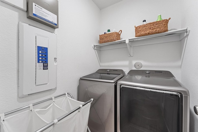 washroom featuring laundry area and independent washer and dryer