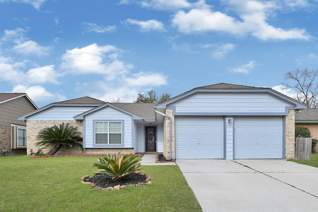 ranch-style house featuring driveway, a garage, a shingled roof, a front lawn, and brick siding