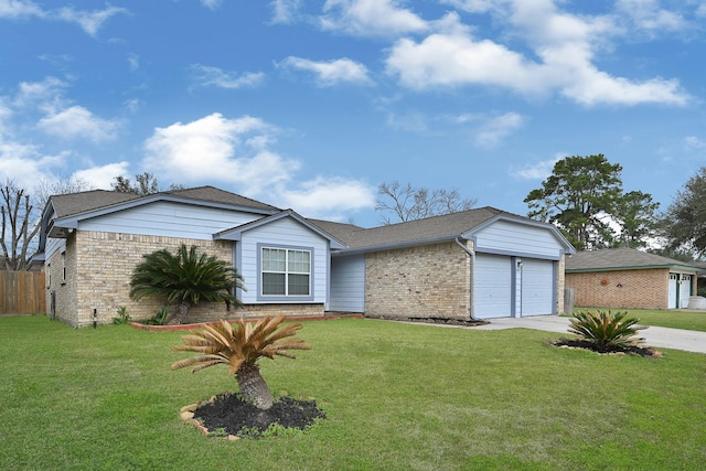 single story home with an attached garage, concrete driveway, brick siding, and a front yard