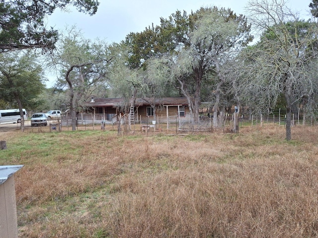 view of front facade with fence