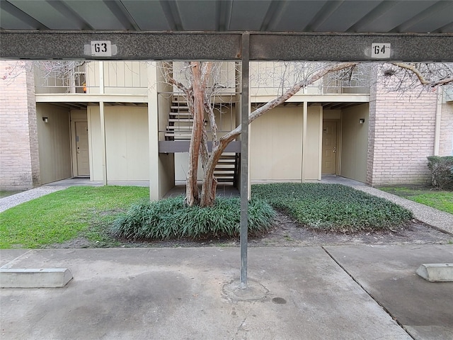 entrance to property with brick siding