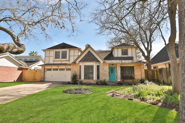 english style home featuring a front yard, concrete driveway, fence, and an attached garage