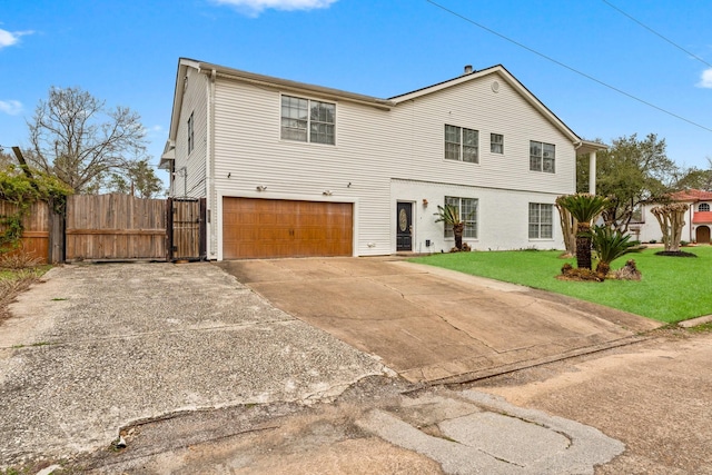 view of front of home featuring concrete driveway, a gate, fence, a garage, and a front lawn