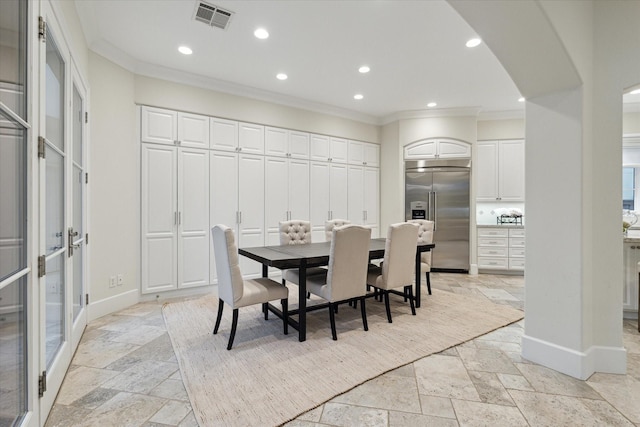 dining space featuring stone tile floors, recessed lighting, visible vents, ornamental molding, and baseboards