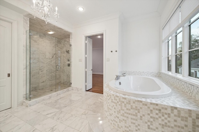 full bathroom featuring a stall shower, marble finish floor, an inviting chandelier, crown molding, and a bath