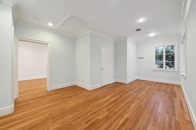 unfurnished room featuring crown molding, recessed lighting, visible vents, light wood-style flooring, and baseboards