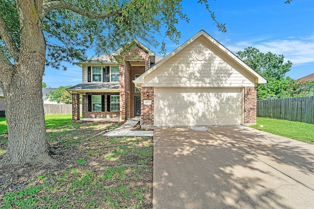 1911 Arrow Star Ct, Katy, TX 77493 - traditional home featuring brick siding, concrete driveway, and an attached garage