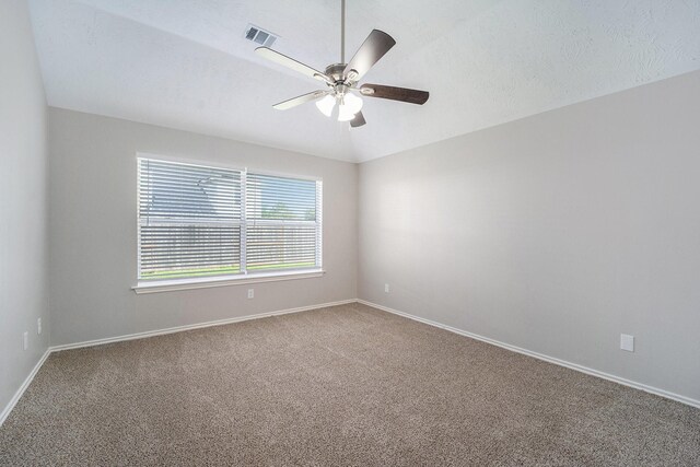 1911 Arrow Star Ct, Katy, TX 77493 - carpeted spare room with ceiling fan and baseboards