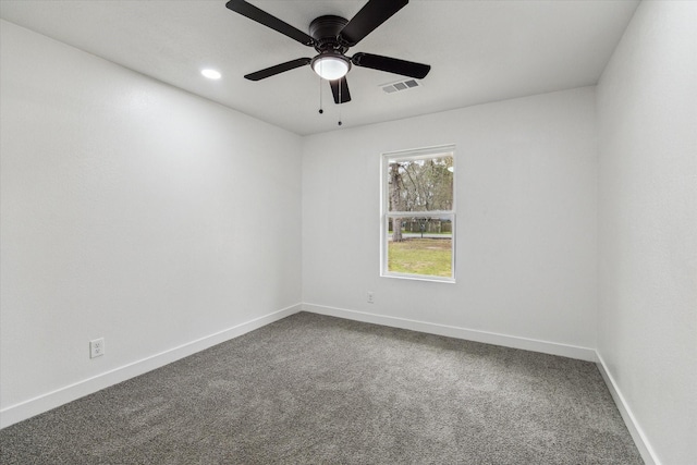 carpeted empty room featuring baseboards, visible vents, ceiling fan, and recessed lighting