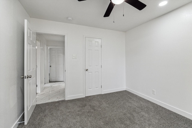 unfurnished bedroom featuring recessed lighting, carpet, a ceiling fan, and baseboards