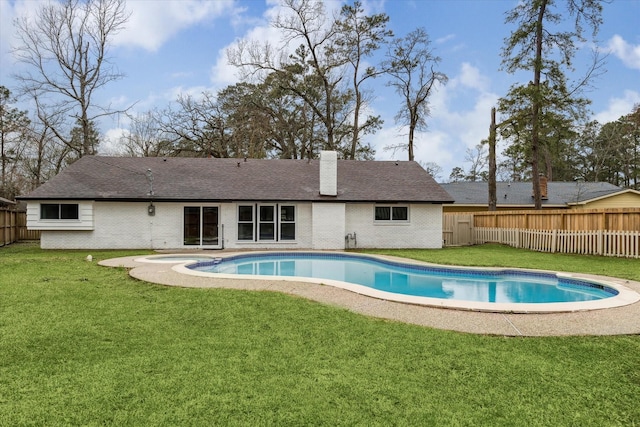 view of swimming pool featuring a yard, a fenced backyard, and a fenced in pool