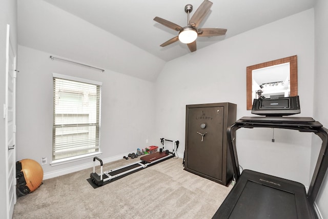 workout area with carpet floors, baseboards, a ceiling fan, and lofted ceiling