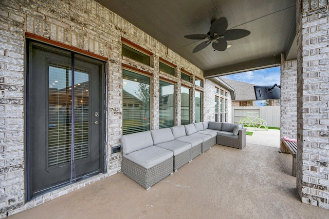 view of patio featuring ceiling fan, fence, and an outdoor hangout area