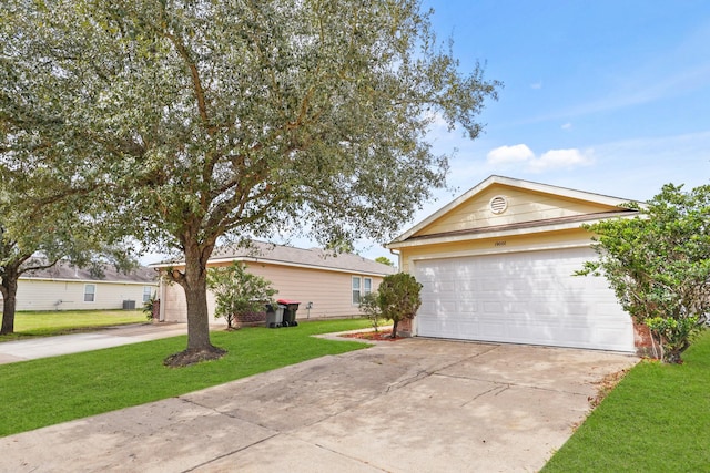 ranch-style home with a front lawn and an outdoor structure