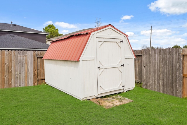 view of shed featuring a fenced backyard