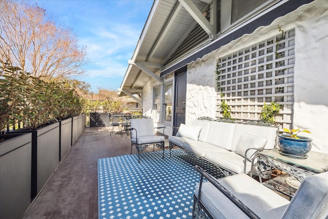 view of patio featuring outdoor dining space and an outdoor hangout area