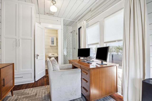 office area with wooden ceiling, visible vents, and dark wood-type flooring