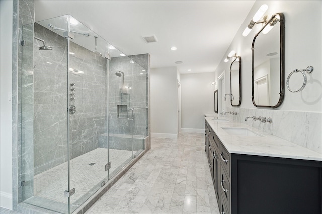 full bathroom with double vanity, a stall shower, a sink, and visible vents