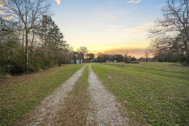 view of street featuring driveway