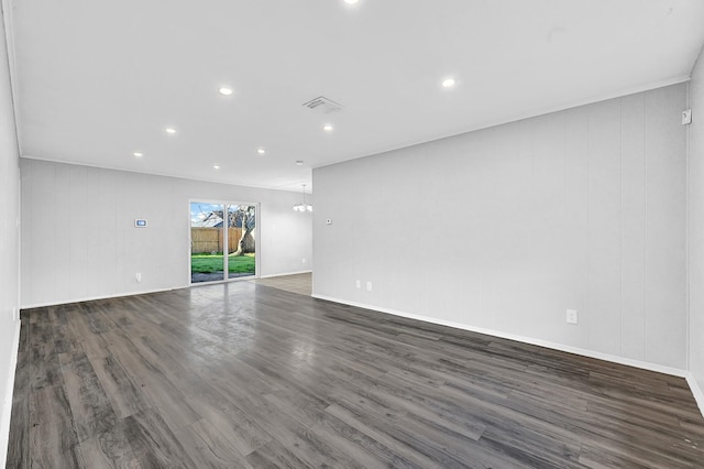 unfurnished living room with recessed lighting, visible vents, baseboards, and wood finished floors