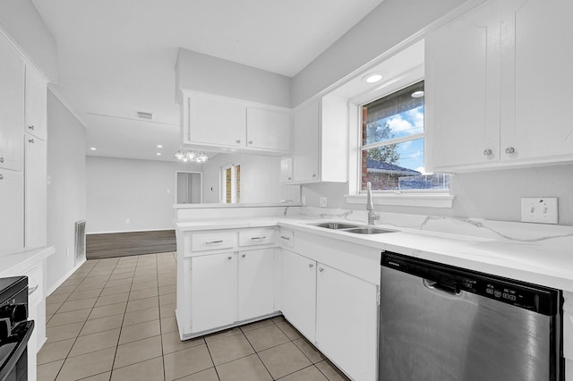 kitchen featuring light tile patterned floors, a sink, visible vents, white cabinets, and stainless steel dishwasher