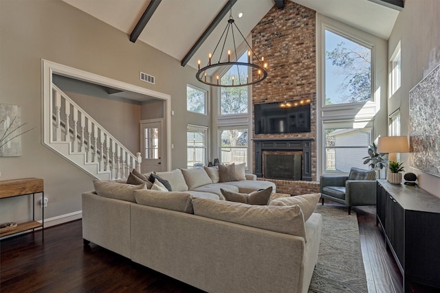 living room featuring baseboards, dark wood finished floors, beamed ceiling, a brick fireplace, and high vaulted ceiling