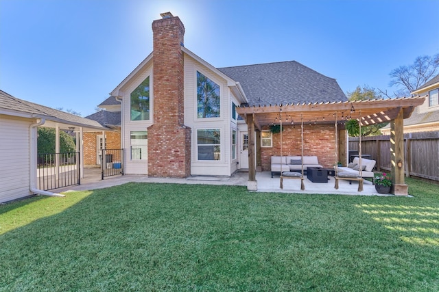 rear view of property featuring a yard, a patio area, fence, and an outdoor living space