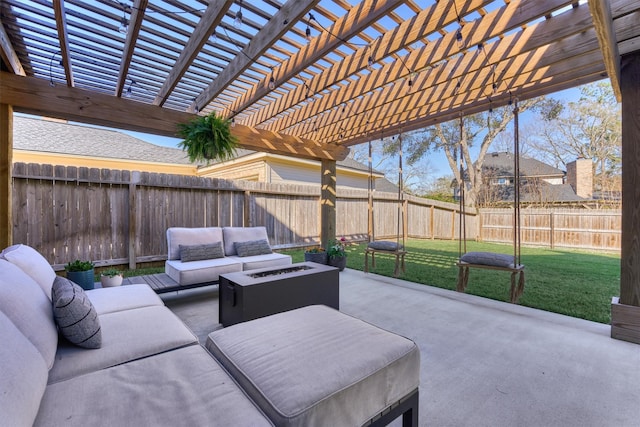 view of patio / terrace featuring a fenced backyard and an outdoor living space with a fire pit