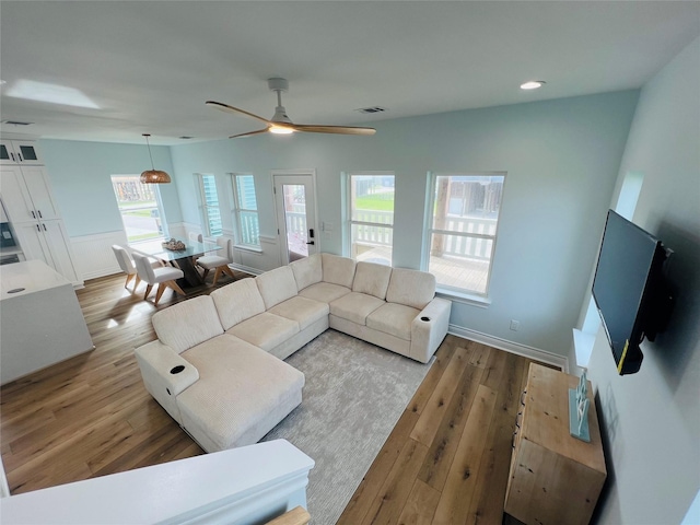 4411 Ranger Dr, Crystal Beach, TX 77650 - living area with wood finished floors and ceiling fan