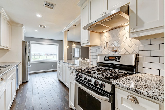 kitchen with under cabinet range hood, dark wood-style flooring, visible vents, white cabinetry, and appliances with stainless steel finishes