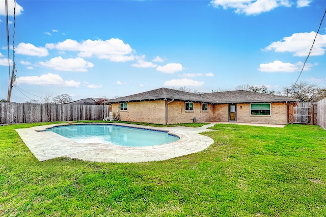 view of pool featuring a fenced backyard, a fenced in pool, and a lawn