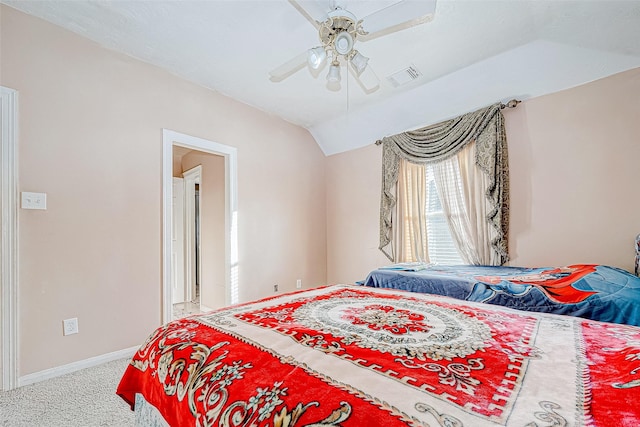 bedroom featuring carpet, lofted ceiling, visible vents, a ceiling fan, and baseboards