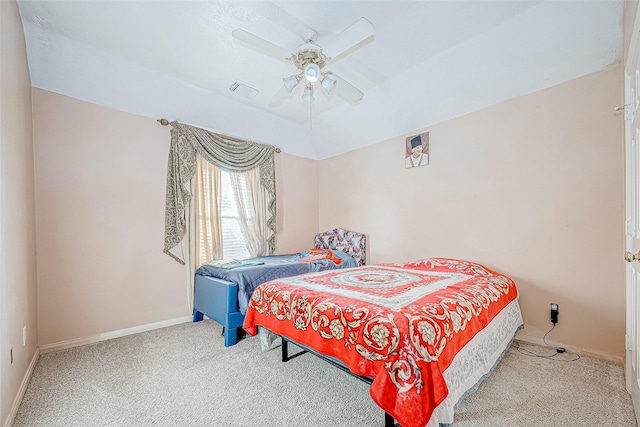 bedroom featuring carpet flooring, ceiling fan, visible vents, and baseboards