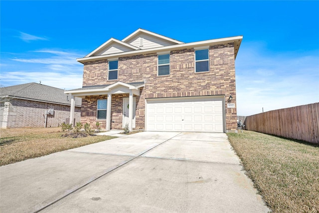 view of front of property featuring driveway, an attached garage, fence, a front lawn, and brick siding